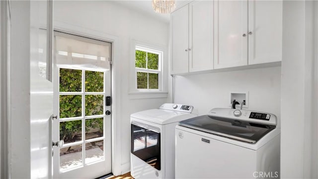 2336 N Riverside Dr, Santa Ana, CA 92706 - laundry room with cabinet space, separate washer and dryer, and a chandelier