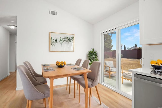 4888 Northerly St, Oceanside, CA 92056 - dining room featuring vaulted ceiling and light wood-type flooring