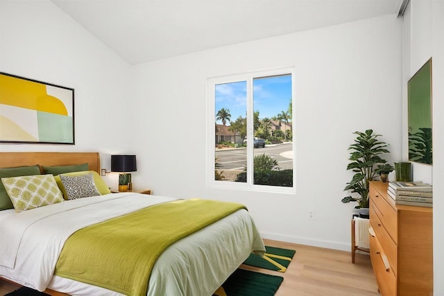 4888 Northerly St, Oceanside, CA 92056 - bedroom with wood finished floors, lofted ceiling, and baseboards