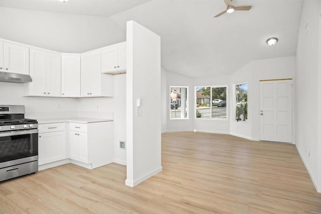 4888 Northerly St, Oceanside, CA 92056 - kitchen with gas stove, lofted ceiling, a ceiling fan, light wood-type flooring, and under cabinet range hood