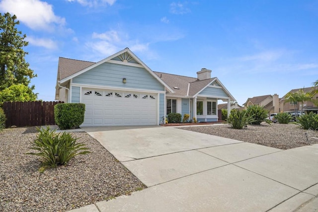 4888 Northerly St, Oceanside, CA 92056 - ranch-style home featuring an attached garage, concrete driveway, a chimney, and a shingled roof