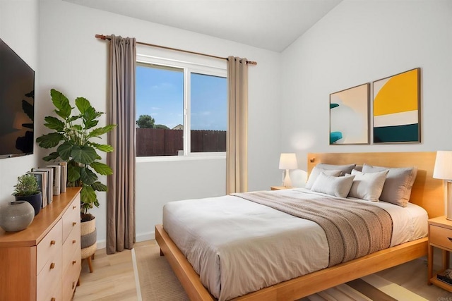 4888 Northerly St, Oceanside, CA 92056 - bedroom featuring light wood-style floors and vaulted ceiling