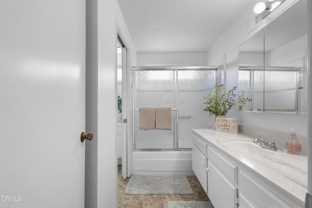 9502 El Portal Ct, Ventura, CA 93004 - bathroom featuring vanity and bath / shower combo with glass door