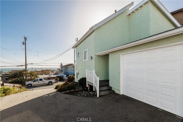 1983 Cirlce Dr, Cayucos, CA 93430 - view of home's exterior with a garage and stucco siding