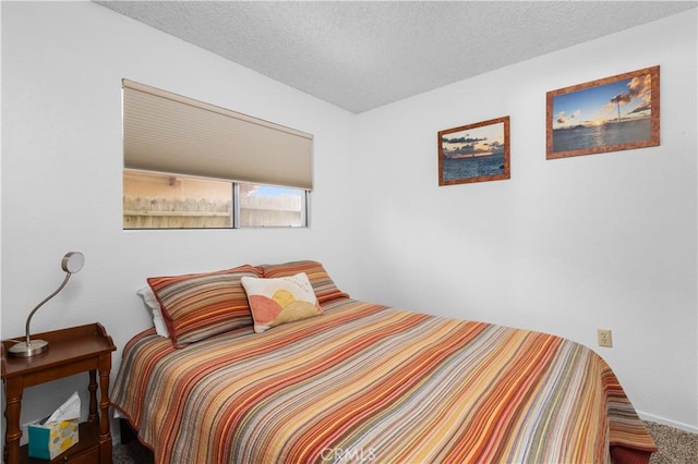 1983 Cirlce Dr, Cayucos, CA 93430 - carpeted bedroom with a textured ceiling