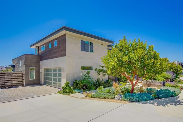 747 S Cedros Ave, Solana Beach, CA 92075 - view of side of home featuring driveway and a garage