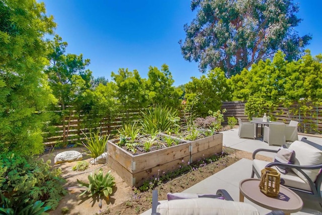 747 S Cedros Ave, Solana Beach, CA 92075 - view of patio with a vegetable garden and outdoor dining area