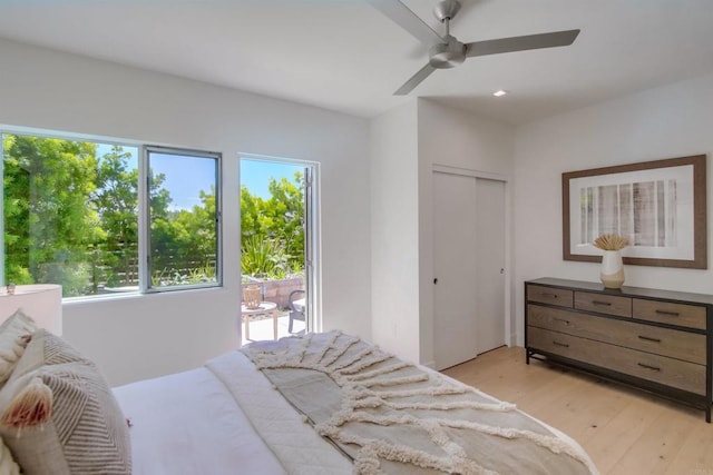 747 S Cedros Ave, Solana Beach, CA 92075 - bedroom featuring multiple windows, light wood finished floors, a ceiling fan, and a closet