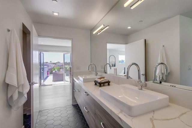 747 S Cedros Ave, Solana Beach, CA 92075 - full bathroom with plenty of natural light, double vanity, and tile patterned flooring