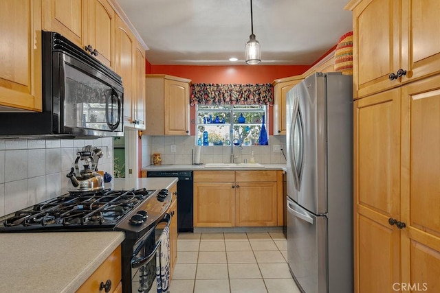 577 S Albertson Ave, Covina, CA 91723 - kitchen with black appliances, a sink, light countertops, light tile patterned floors, and decorative backsplash
