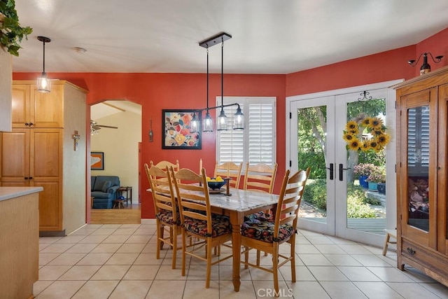 577 S Albertson Ave, Covina, CA 91723 - dining space featuring light tile patterned flooring, french doors, a ceiling fan, and arched walkways