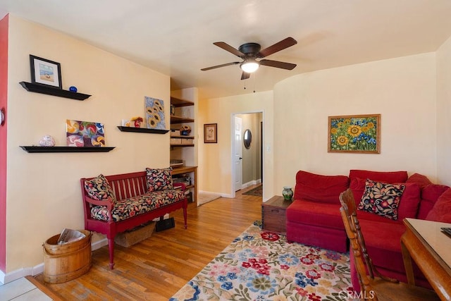 577 S Albertson Ave, Covina, CA 91723 - living room with wood finished floors, a ceiling fan, and baseboards