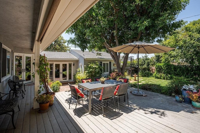 577 S Albertson Ave, Covina, CA 91723 - deck with french doors, outdoor dining space, and a lawn