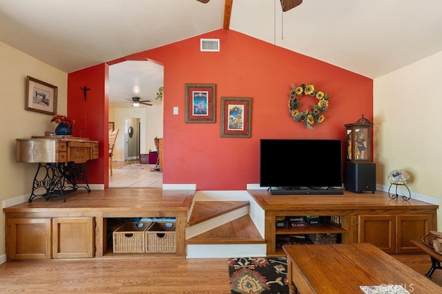 577 S Albertson Ave, Covina, CA 91723 - living area featuring a ceiling fan, lofted ceiling, light wood-style flooring, arched walkways, and baseboards