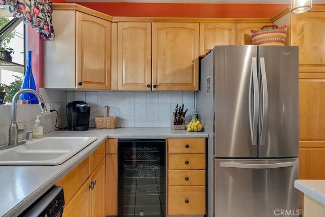 577 S Albertson Ave, Covina, CA 91723 - kitchen with freestanding refrigerator, wine cooler, a sink, light countertops, and tasteful backsplash