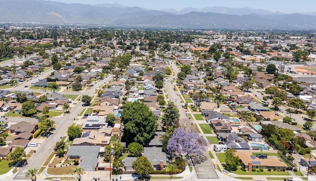 577 S Albertson Ave, Covina, CA 91723 - aerial view of property and surrounding area with mountains and nearby suburban area