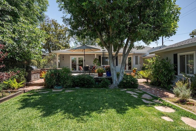 577 S Albertson Ave, Covina, CA 91723 - back of house featuring french doors, a lawn, and stucco siding