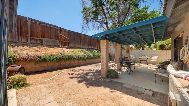 3458 Santa Barbara Ct, Palmdale, CA 93550 - fenced backyard with a patio area