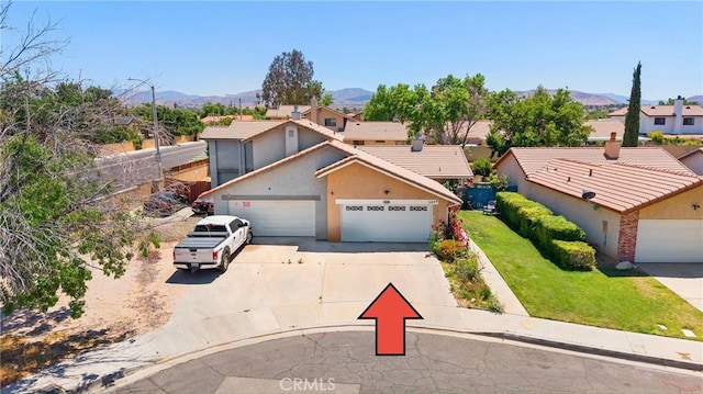 3458 Santa Barbara Ct, Palmdale, CA 93550 - traditional home with a mountain view, driveway, and a residential view