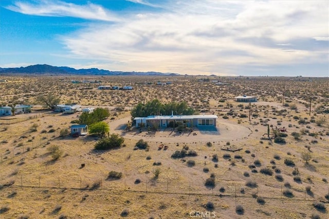 4171 Hughes Ln, Landers, CA 92285 - aerial view of sparsely populated area with a desert landscape and a mountain backdrop