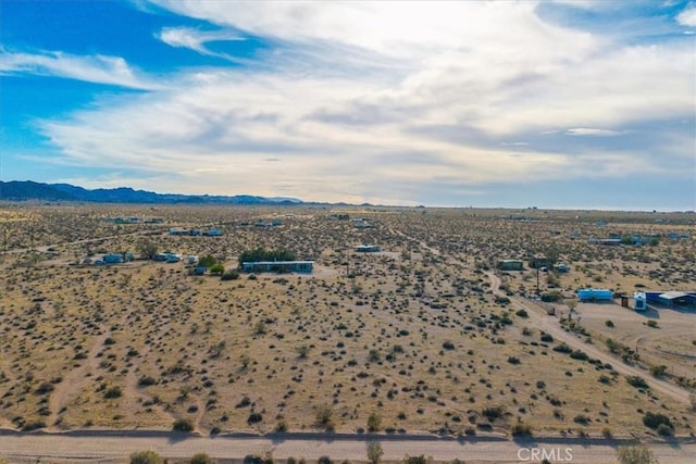 4171 Hughes Ln, Landers, CA 92285 - aerial view of sparsely populated area featuring a desert landscape and a mountain backdrop