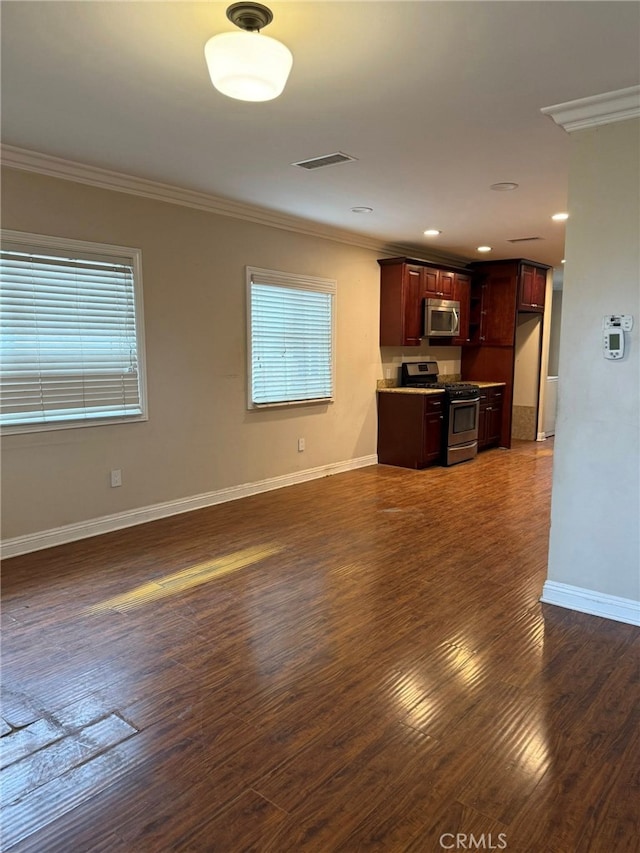 1030 E M St, Wilmington, CA 90744 - unfurnished living room with ornamental molding, dark wood-style flooring, baseboards, and recessed lighting
