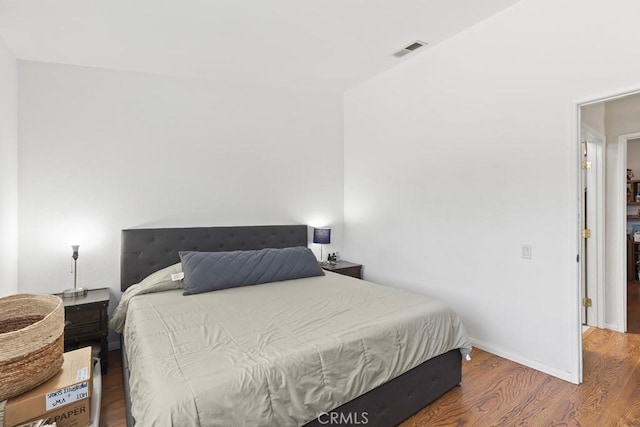 16251 Malaga St, Fontana, CA 92336 - bedroom with wood finished floors and baseboards