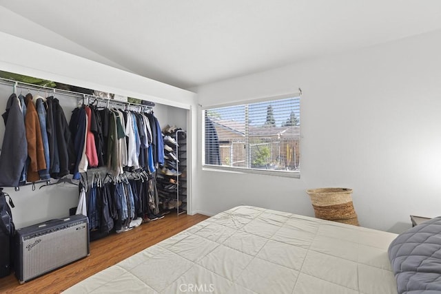 16251 Malaga St, Fontana, CA 92336 - bedroom with wood finished floors and vaulted ceiling
