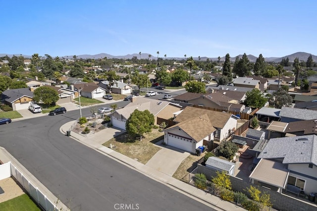 16251 Malaga St, Fontana, CA 92336 - aerial view of residential area featuring a mountainous background