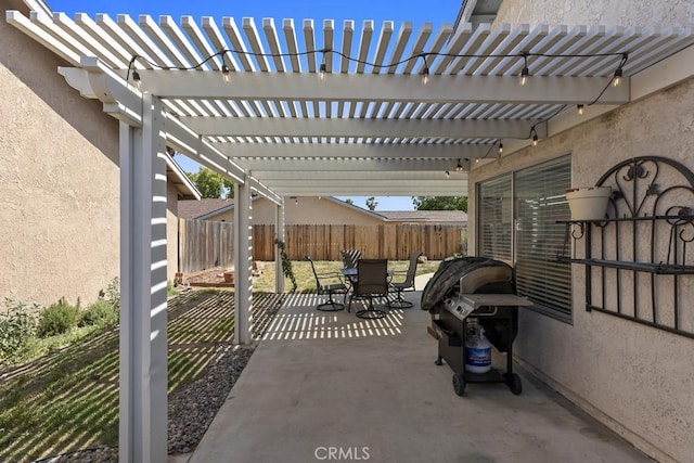 16251 Malaga St, Fontana, CA 92336 - fenced backyard with outdoor dining area, a pergola, and a patio area