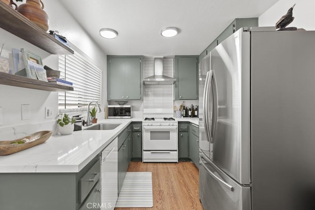 16251 Malaga St, Fontana, CA 92336 - kitchen featuring stainless steel appliances, wall chimney exhaust hood, and gray cabinets
