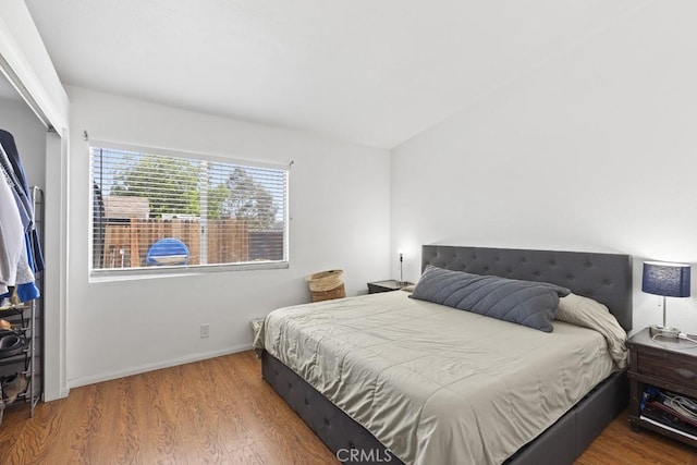 16251 Malaga St, Fontana, CA 92336 - bedroom featuring wood finished floors and baseboards