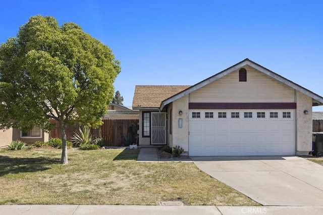 16251 Malaga St, Fontana, CA 92336 - ranch-style house with a garage, driveway, and stucco siding