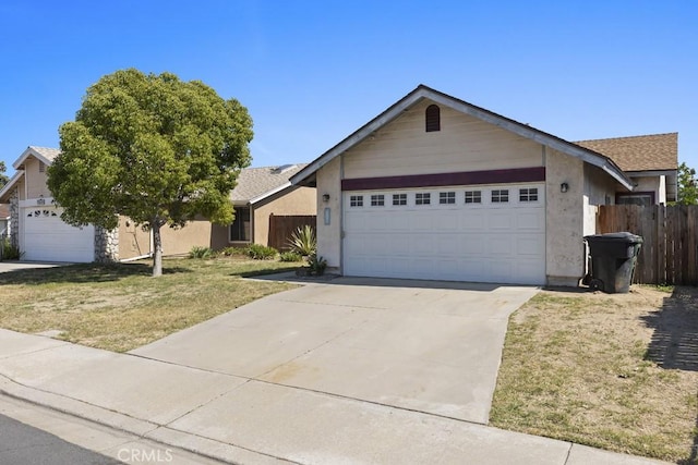 16251 Malaga St, Fontana, CA 92336 - single story home featuring a garage, concrete driveway, and stucco siding