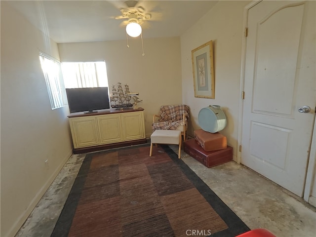 49438 Conejo Rd, Morongo Valley, CA 92256 - living area featuring ceiling fan and concrete flooring