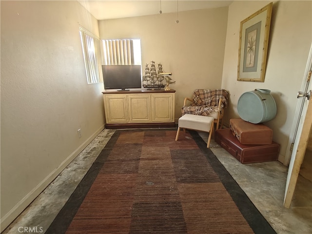 49438 Conejo Rd, Morongo Valley, CA 92256 - sitting room with concrete flooring and baseboards