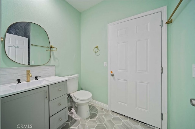 18189 Kalin Ranch Dr, Victorville, CA 92395 - bathroom featuring vanity, backsplash, and tile patterned floors