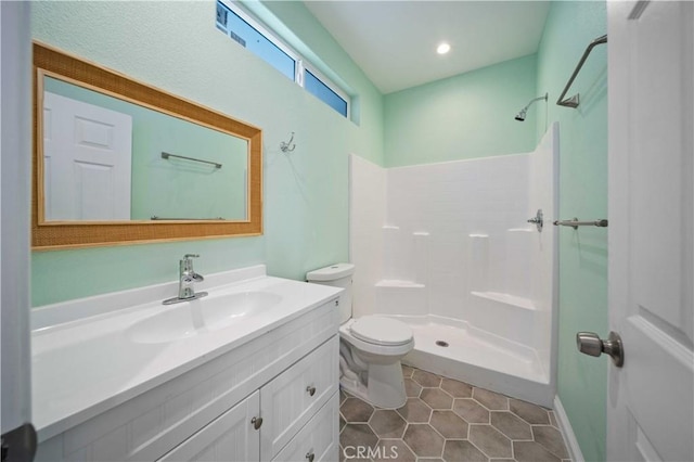 18189 Kalin Ranch Dr, Victorville, CA 92395 - bathroom featuring vanity, a shower, and tile patterned floors