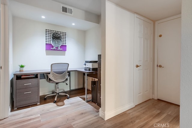 7411 Brava St, Carlsbad, CA 92009 - home office featuring wood finished floors, baseboards, and recessed lighting