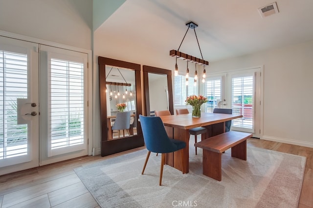7411 Brava St, Carlsbad, CA 92009 - dining room featuring light wood-style flooring