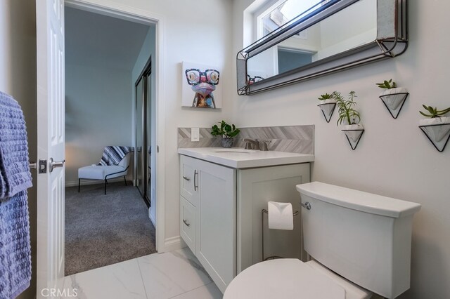 7411 Brava St, Carlsbad, CA 92009 - bathroom with toilet and vanity