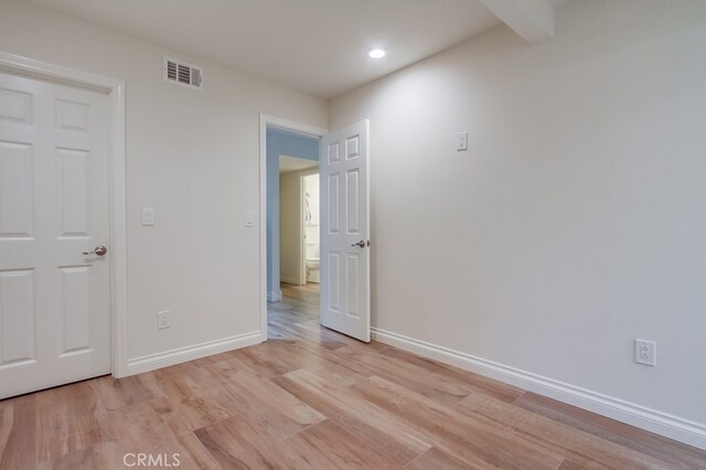 7411 Brava St, Carlsbad, CA 92009 - spare room featuring light wood finished floors, baseboards, and recessed lighting
