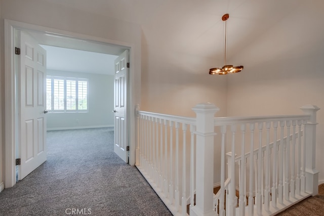 7411 Brava St, Carlsbad, CA 92009 - hall featuring an upstairs landing, carpet floors, a chandelier, and lofted ceiling