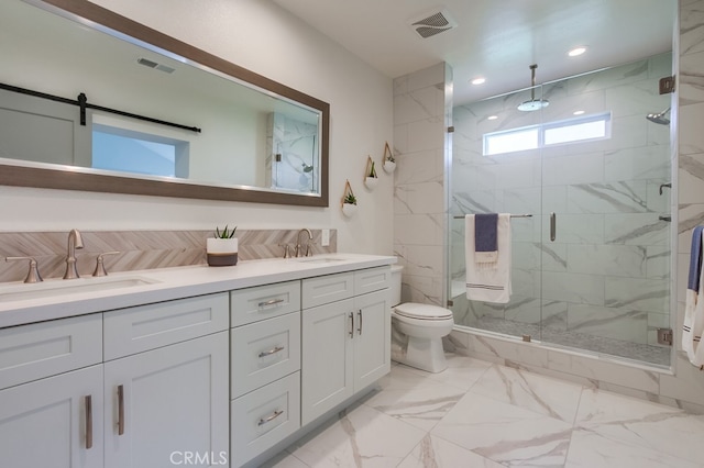 7411 Brava St, Carlsbad, CA 92009 - full bathroom with toilet, a marble finish shower, double vanity, marble finish floors, and recessed lighting
