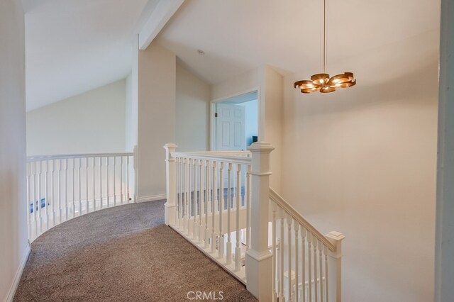 7411 Brava St, Carlsbad, CA 92009 - hallway with an upstairs landing, a chandelier, and carpet flooring