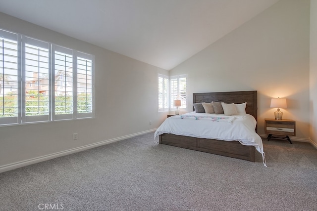 7411 Brava St, Carlsbad, CA 92009 - carpeted bedroom featuring multiple windows, baseboards, and high vaulted ceiling