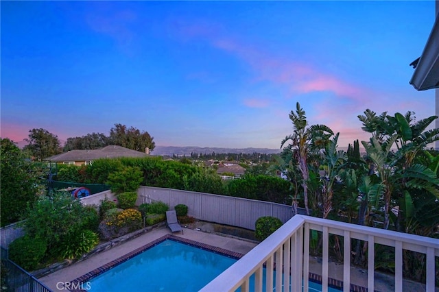 20640 Smoketree Ave, Yorba Linda, CA 92886 - pool at dusk with a fenced backyard and a water slide