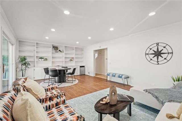 25001 Mackenzie St, Laguna Hills, CA 92653 - living area with crown molding, recessed lighting, light wood-style floors, and baseboards