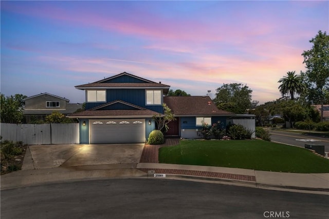 25001 Mackenzie St, Laguna Hills, CA 92653 - traditional home with concrete driveway and a garage