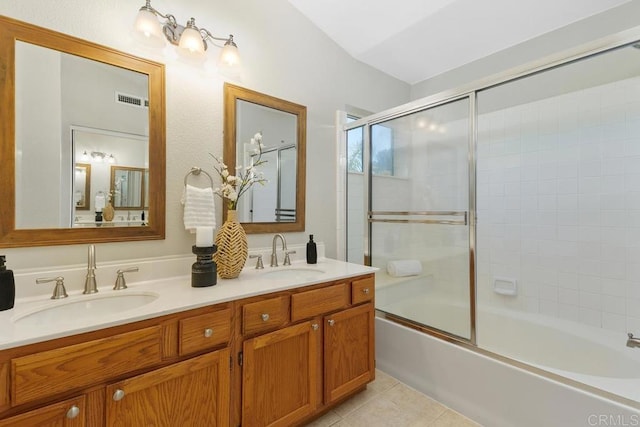 32175 Via Flore, Temecula, CA 92592 - bathroom with double vanity, combined bath / shower with glass door, and tile patterned floors